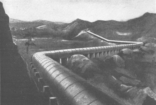 Part of the Los Angeles Aqueduct, California  This Aqueduct is 11 feet in diameter and carries water from Owens River 246 miles to Los Angeles. Part of the Los Angeles Aqueduct, California  This Aqueduct is 11 feet in diameter and carries water from Owens River 246 miles to Los Angeles.